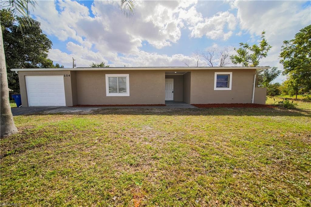 204 Jasmine RD W LEHIGH ACRES, FL 33936