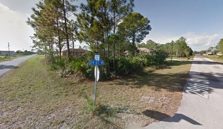 2803 RITA AVE N LEHIGH ACRES, FL 33971