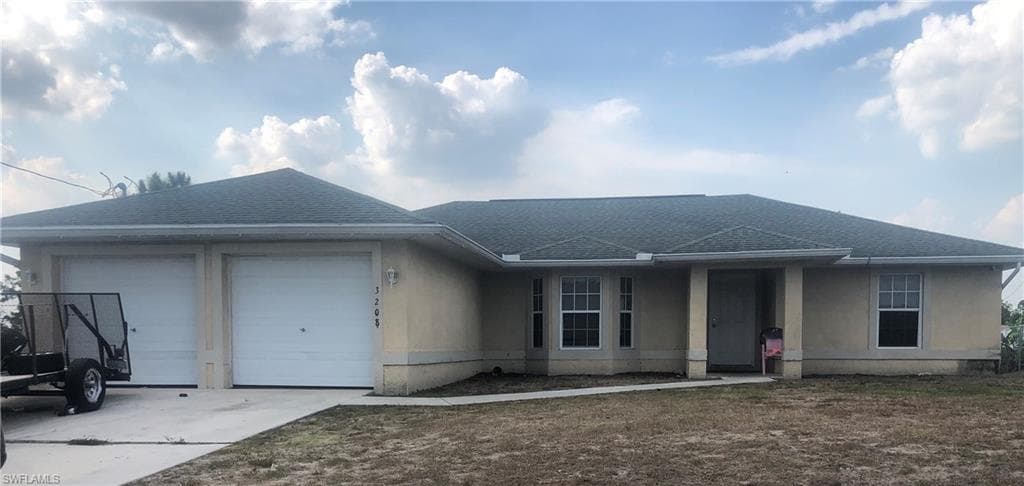 3208 6th ST W LEHIGH ACRES, FL 33971