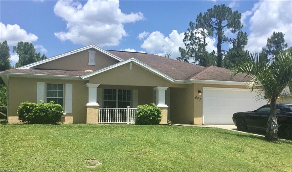623 Summit AVE S LEHIGH ACRES, FL 33974