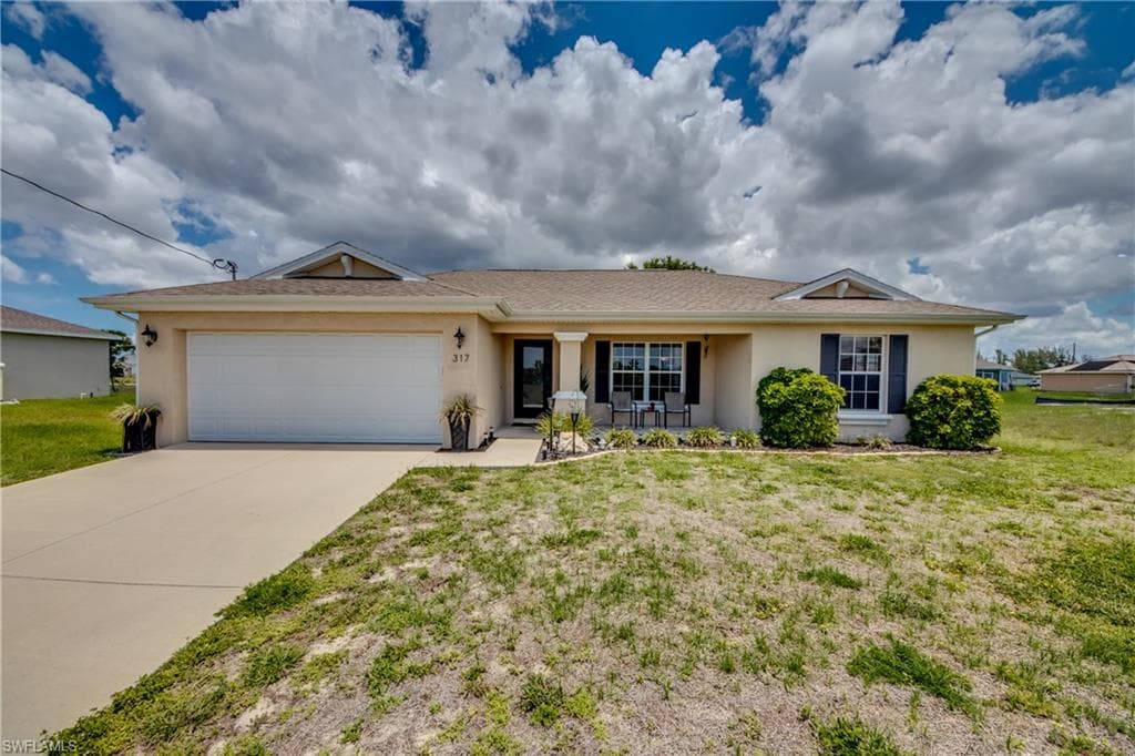 317 NW 20th TER CAPE CORAL, FL 33993