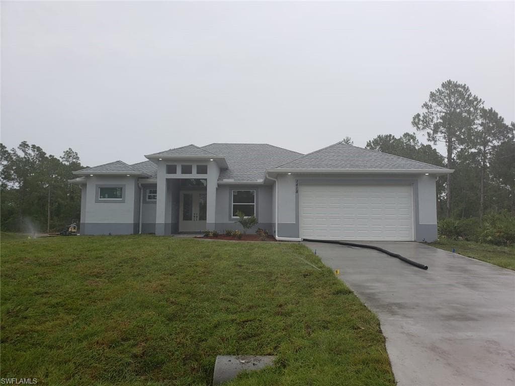 1422 OAK AVE LEHIGH ACRES, FL 33972