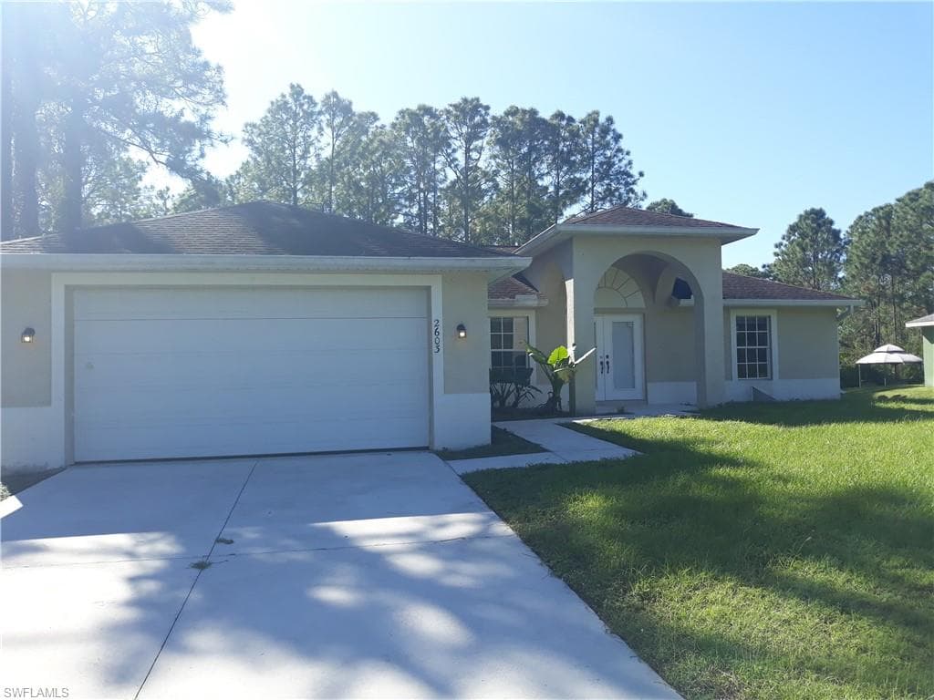 2603 34th ST W LEHIGH ACRES, FL 33971