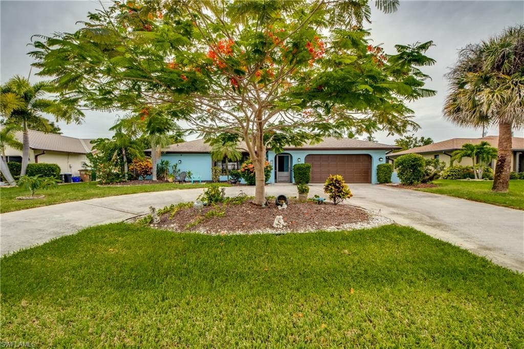 703 Wildwood PKY CAPE CORAL, FL 33904