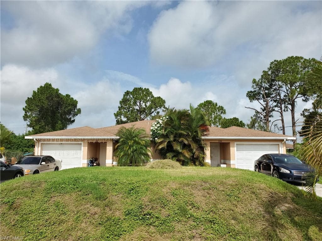 220/222 Ivan AVE S LEHIGH ACRES, FL 33973