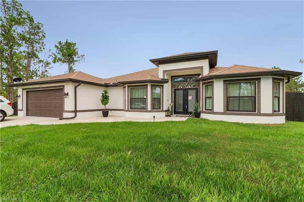 703 Truman AVE LEHIGH ACRES, FL 33972