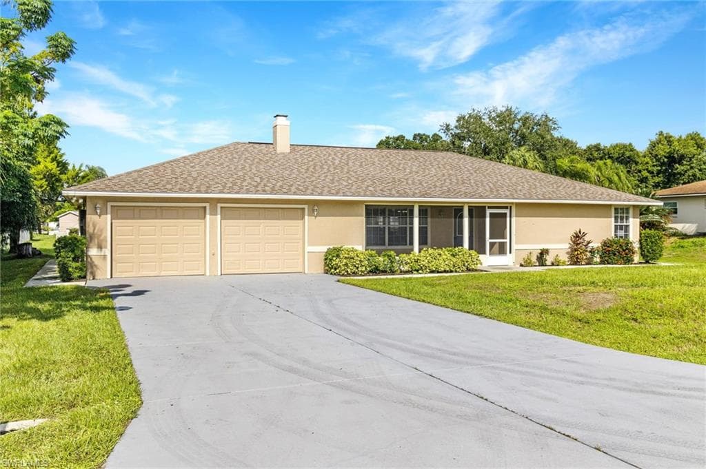 303 Cleveland AVE LEHIGH ACRES, FL 33936