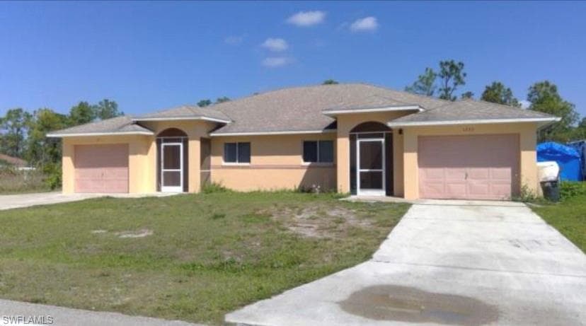 1221 E 12th ST LEHIGH ACRES, FL 33972