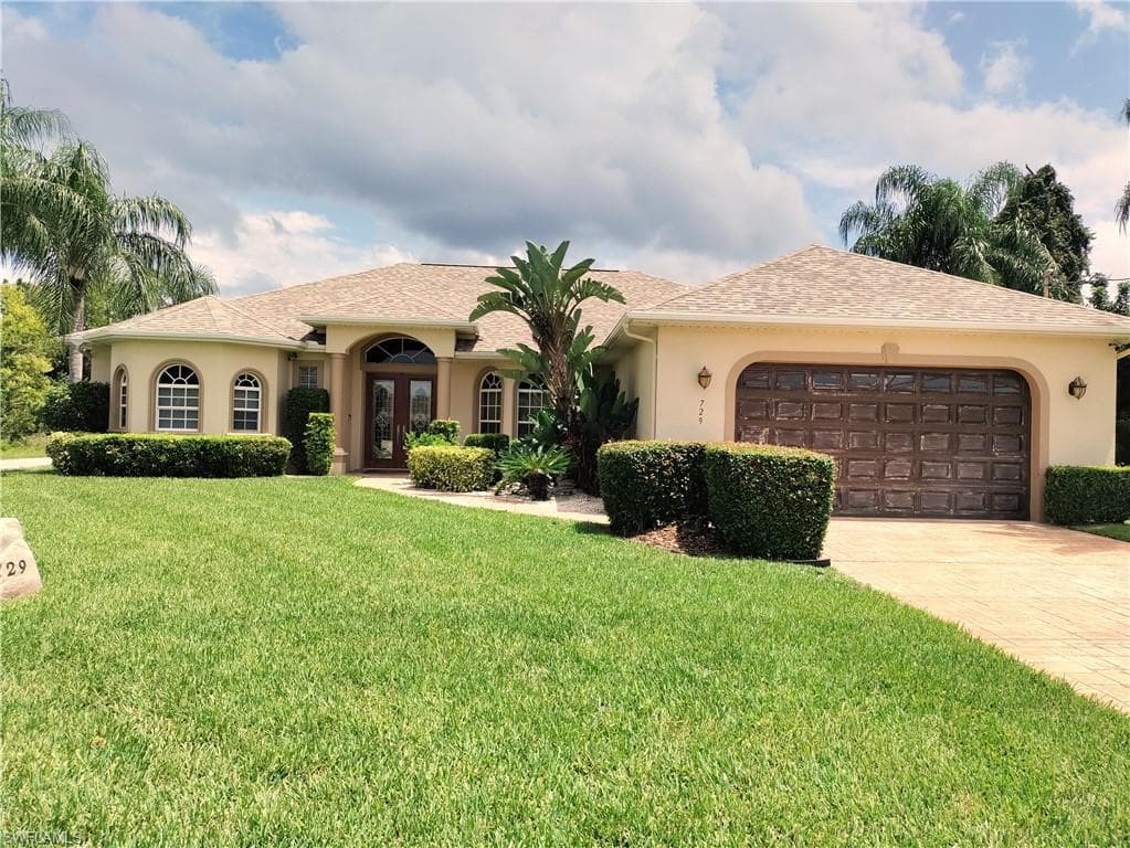 729 Milwaukee BLVD LEHIGH ACRES, FL 33974