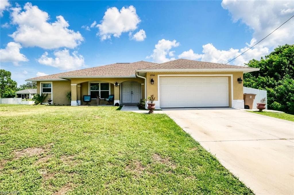 2706 6th ST SW LEHIGH ACRES, FL 33976