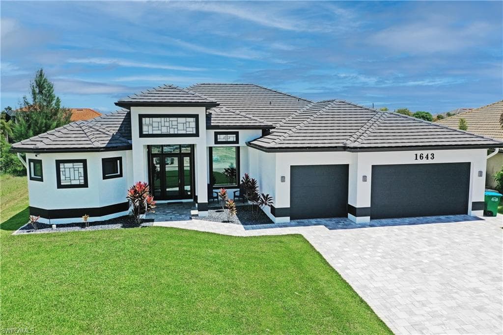 1643 NW 38th AVE CAPE CORAL, FL 33993
