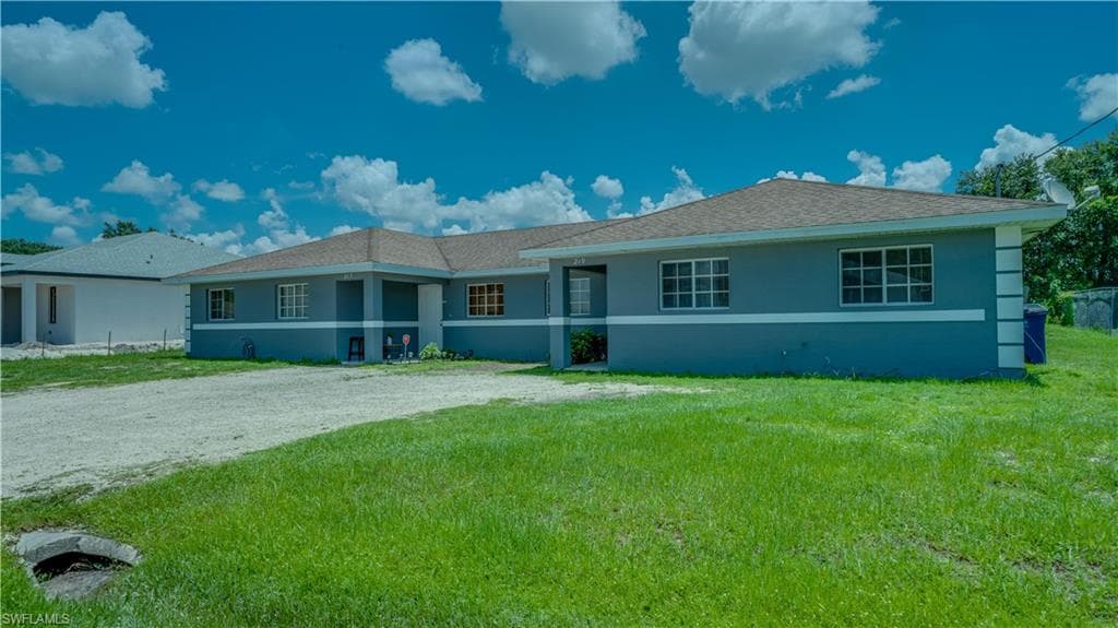 217/219 Hightower AVE S LEHIGH ACRES, FL 33973