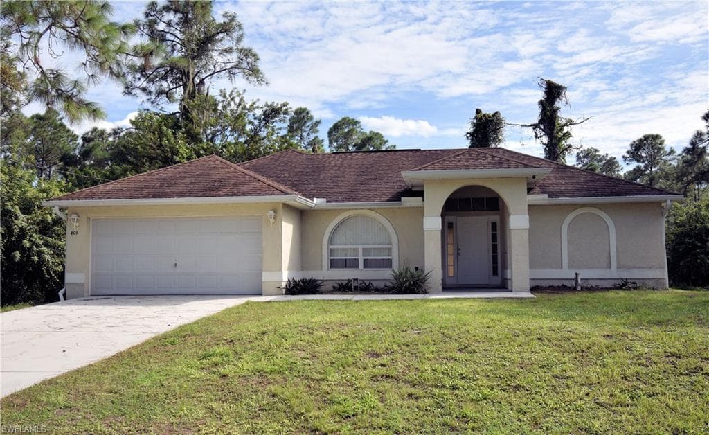 403 W 11th ST LEHIGH ACRES, FL 33972