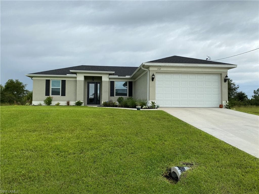 1703 NW 26th ST CAPE CORAL, FL 33993