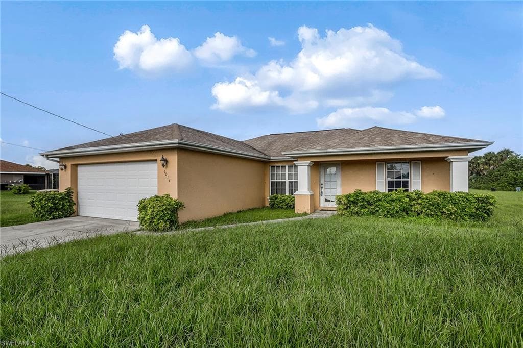 1014 Nelson RD N CAPE CORAL, FL 33993