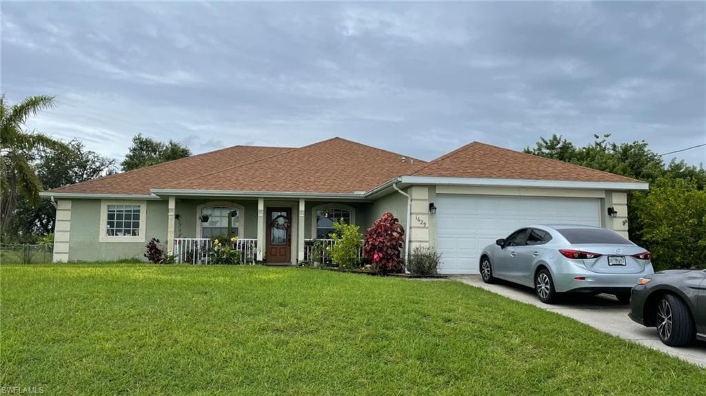 1629 N Gator CIR CAPE CORAL, FL 33909