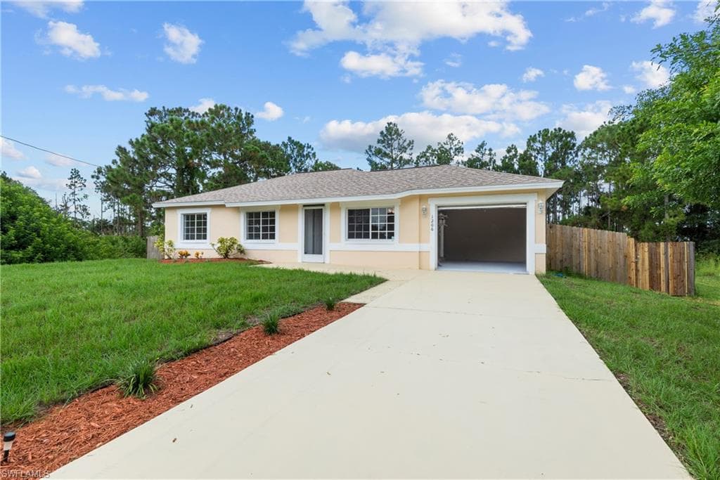 1206 Jaguar BLVD LEHIGH ACRES, FL 33974