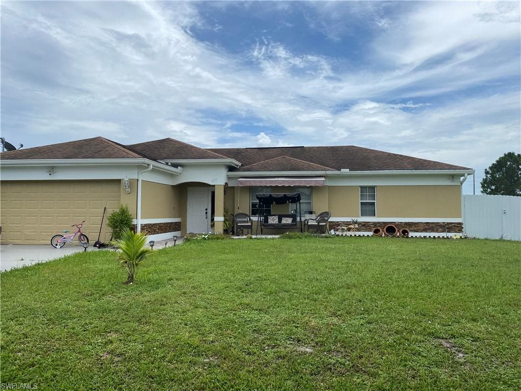 3111 53RD ST W LEHIGH ACRES, FL 33971