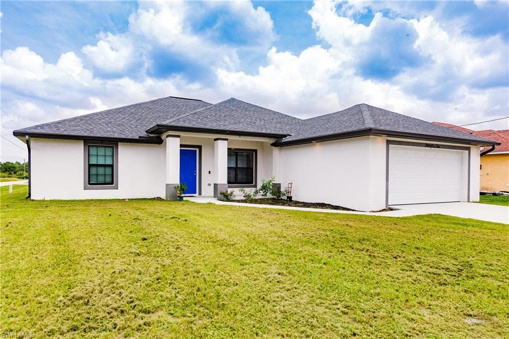 3110 13th ST W LEHIGH ACRES, FL 33971