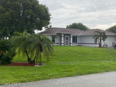 911 NW 20th AVE CAPE CORAL, FL 33993