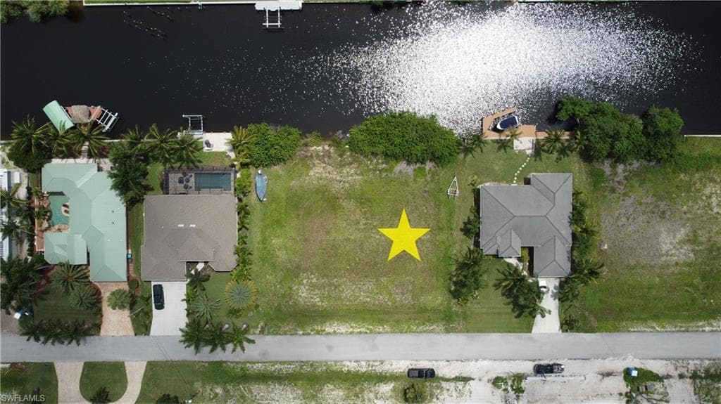 1233 NW 39th AVE CAPE CORAL, FL 33993
