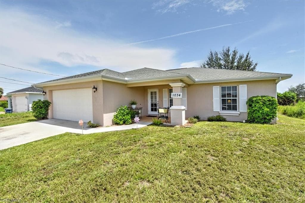 1034 Champion AVE LEHIGH ACRES, FL 33971