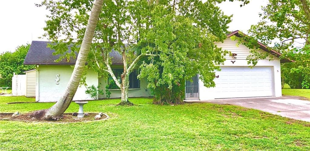 704 Jack AVE N LEHIGH ACRES, FL 33971