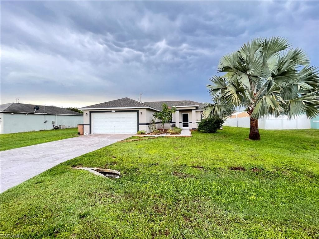 580 Thomas Sherwin AVE S LEHIGH ACRES, FL 33974