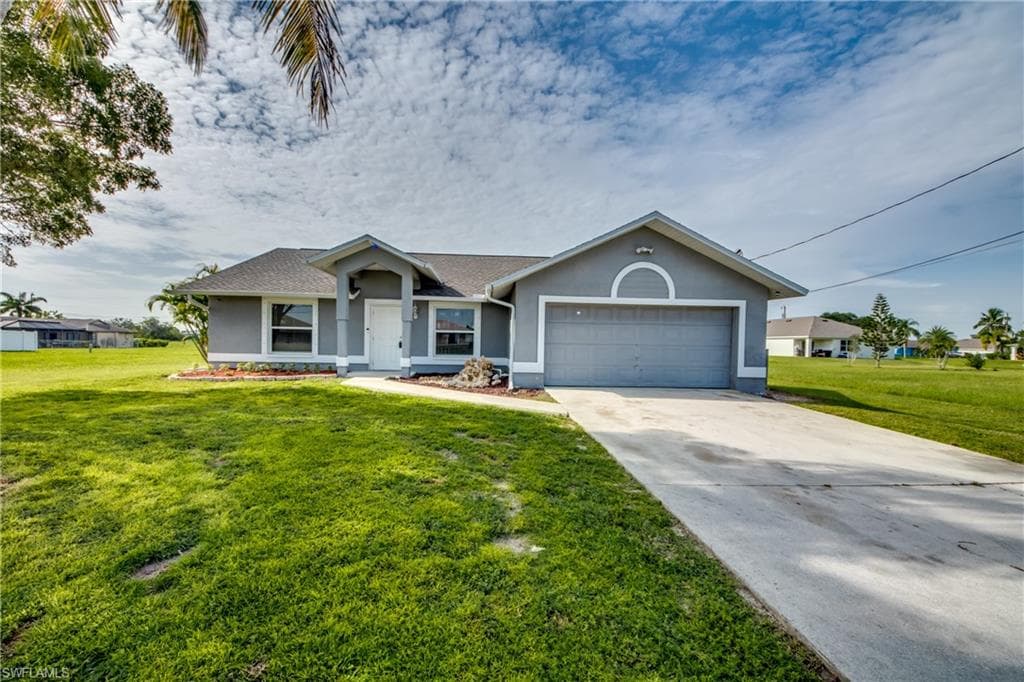 1002 NE 11th TER CAPE CORAL, FL 33909