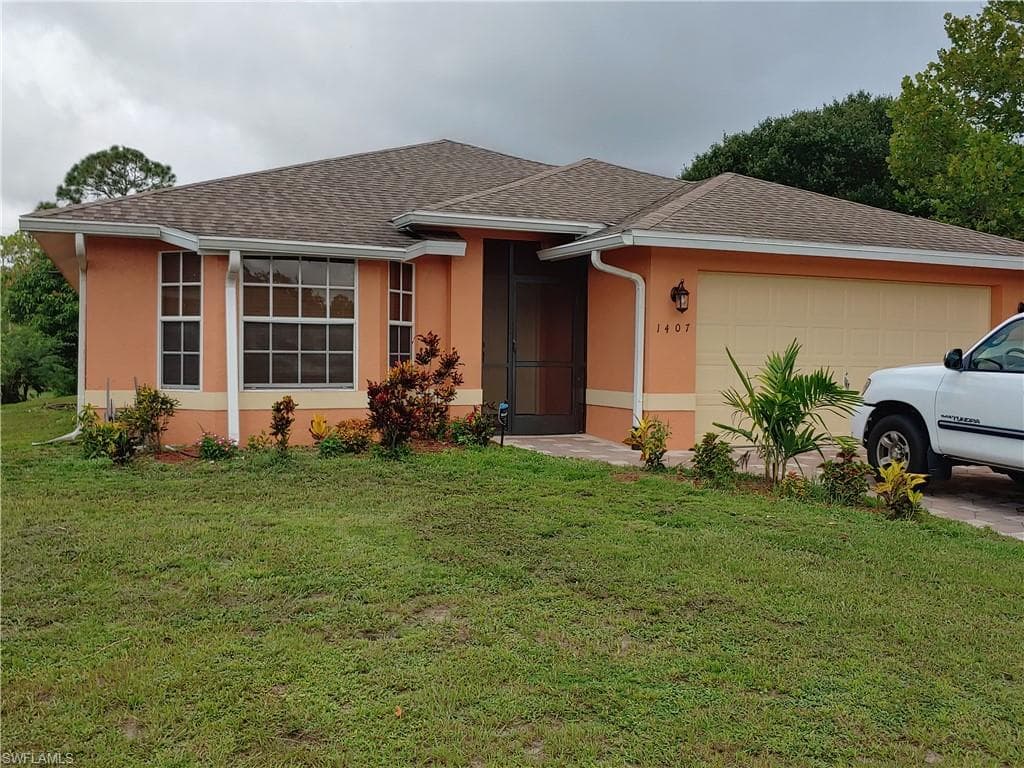 1407 Poinsettia AVE LEHIGH ACRES, FL 33972