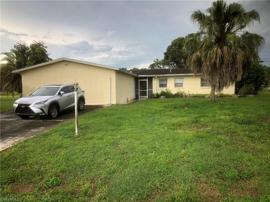 203 E Jasmine RD LEHIGH ACRES, FL 33936