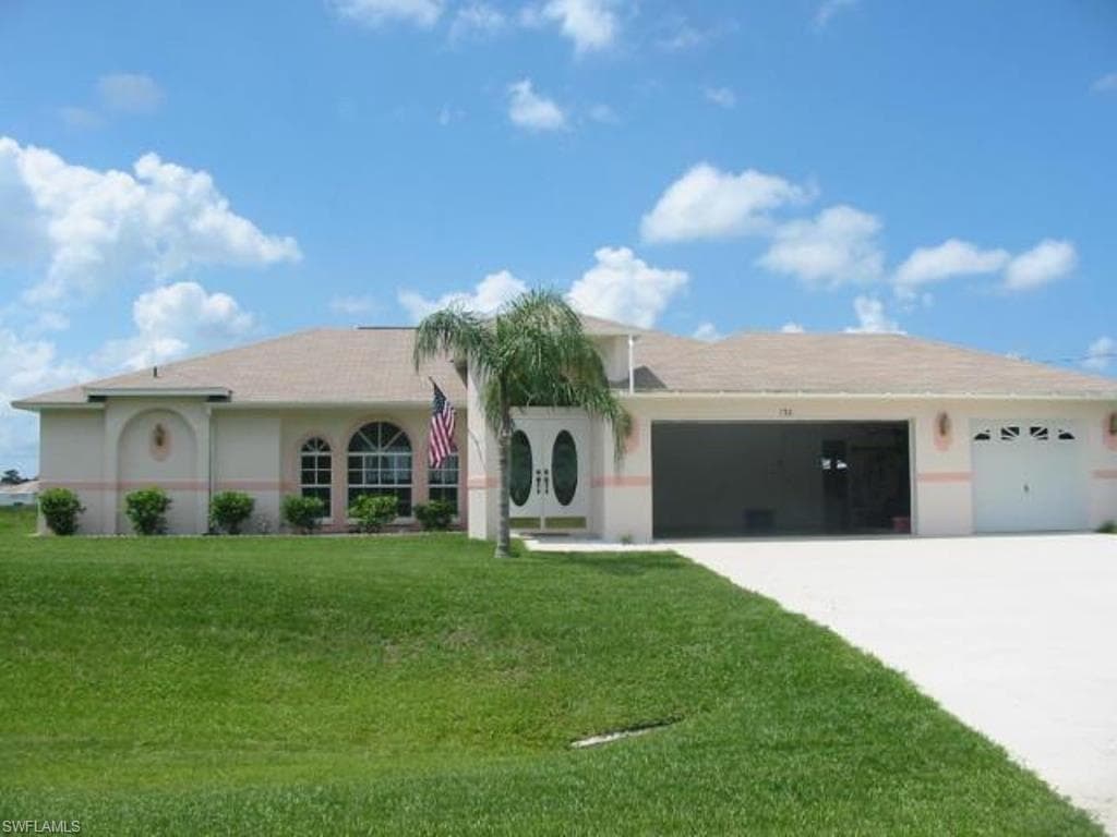 130 Theodore Vail ST E LEHIGH ACRES, FL 33974