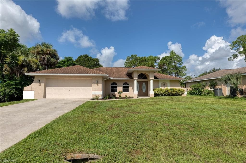 1407 Elaine AVE N LEHIGH ACRES, FL 33971