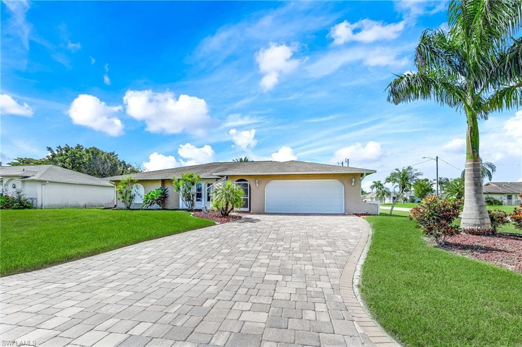 1702 SE 10th ST CAPE CORAL, FL 33990