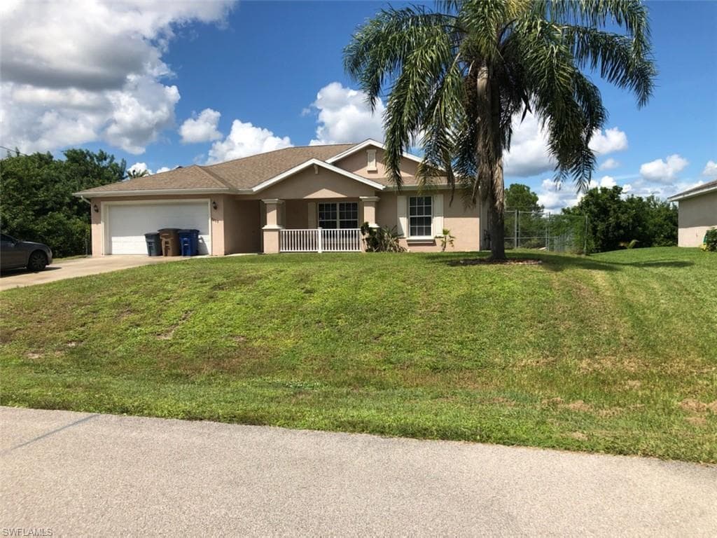 3208 13th ST SW LEHIGH ACRES, FL 33976