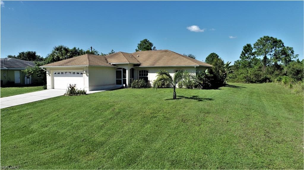 911 Mckinley AVE LEHIGH ACRES, FL 33972
