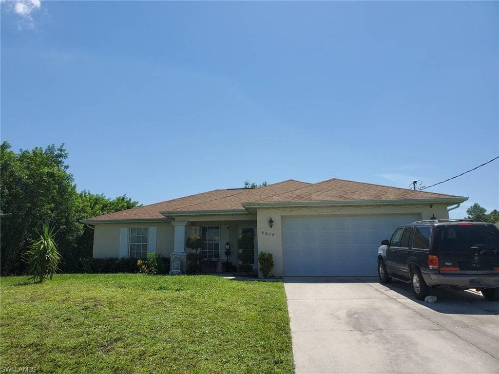 6010 Flora AVE N LEHIGH ACRES, FL 33971