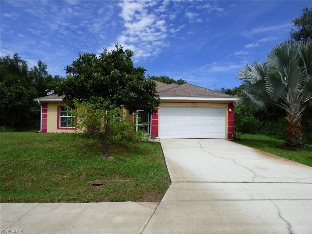 1703 E 6th ST LEHIGH ACRES, FL 33972