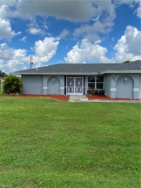 1407 Graham CIR E LEHIGH ACRES, FL 33936