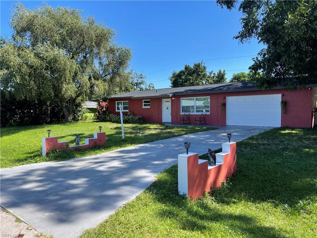 306 JERSEY RD W LEHIGH ACRES, FL 33936