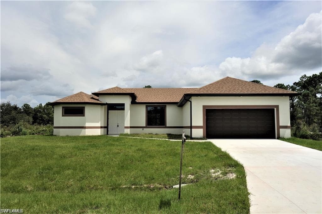 1613 Edison AVE LEHIGH ACRES, FL 33972