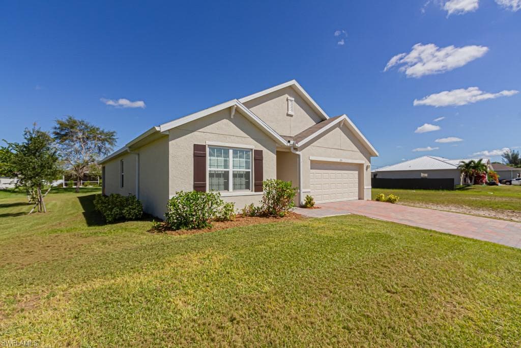 215 13th TER CAPE CORAL, FL 33993