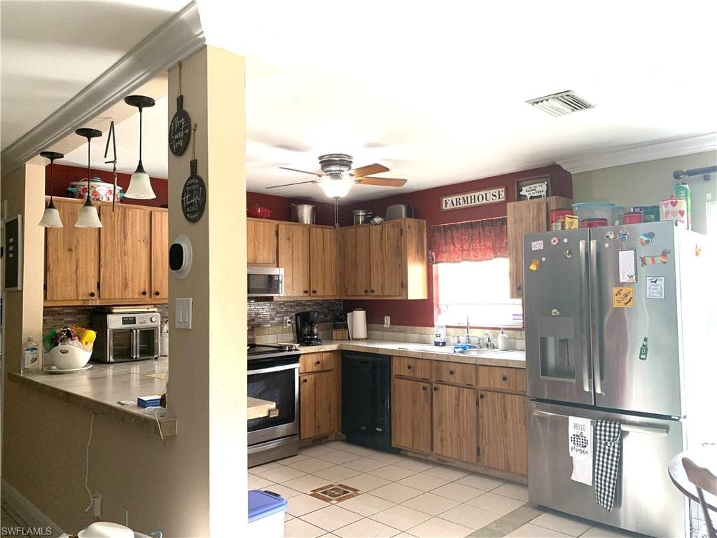 1421 NE 7th AVE CAPE CORAL, FL 33909