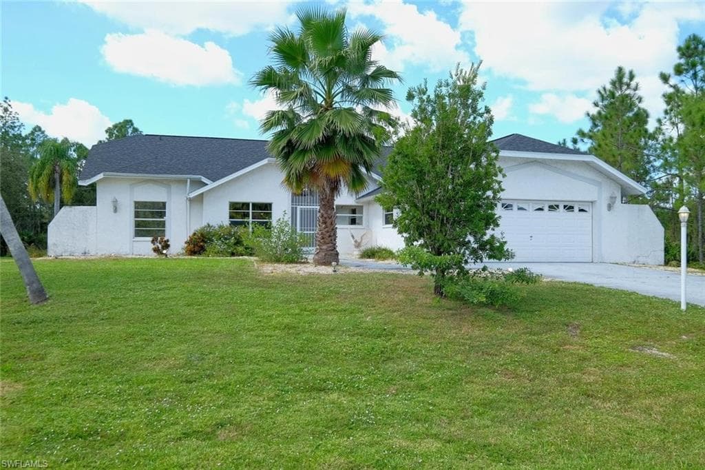 517 Thompson AVE LEHIGH ACRES, FL 33972