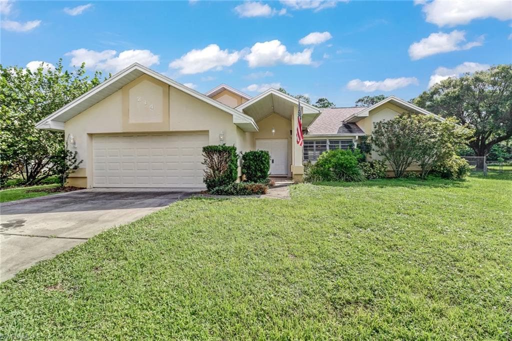 214 Hamilton AVE LEHIGH ACRES, FL 33936