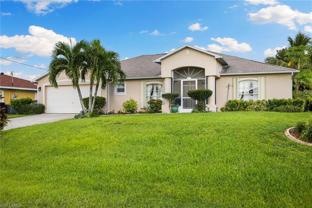 927 NW 10th AVE CAPE CORAL, FL 33993