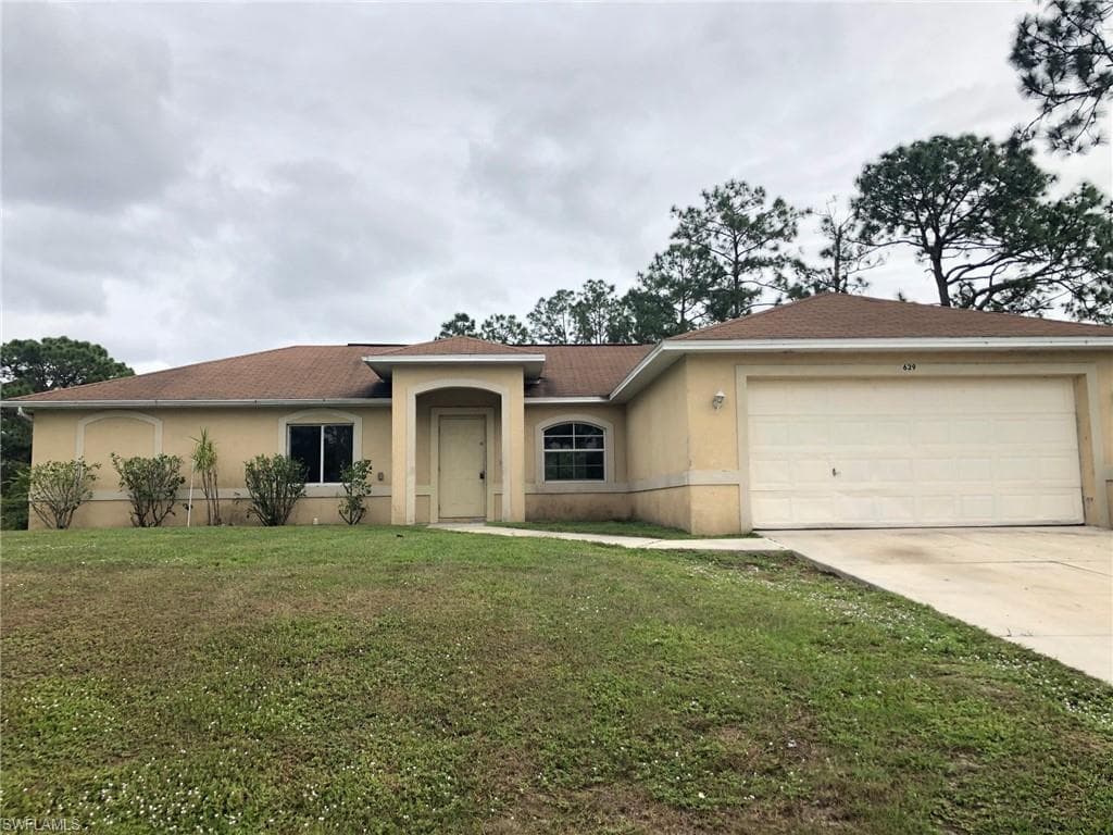 629 Bond AVE S LEHIGH ACRES, FL 33974