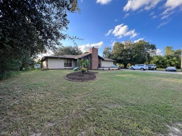 401 Maple AVE N LEHIGH ACRES, FL 33972