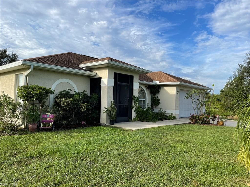 1106 E 10th ST LEHIGH ACRES, FL 33972