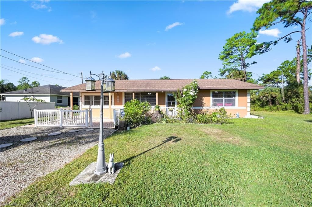 703 Clayton AVE LEHIGH ACRES, FL 33972
